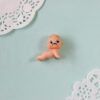 Kewpie deitado - Mustache