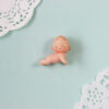 Kewpie deitado - Olhos fechados